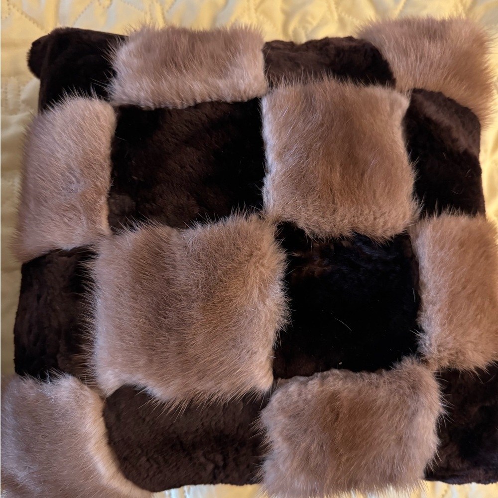 Two fur accent pillows